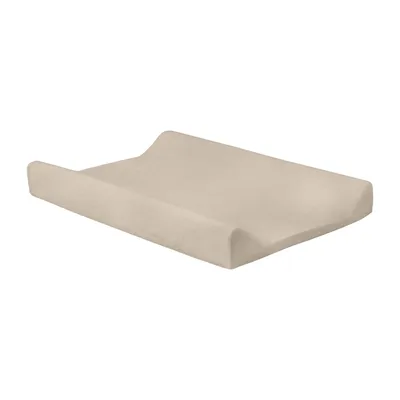 A beige changing pad on a white background.