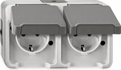 A close-up front view of a white and gray double electrical outlet with protective covers.
