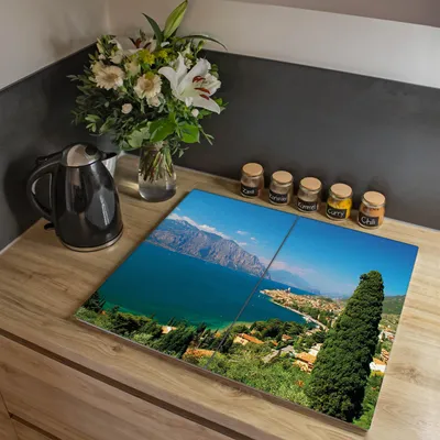 Produktbild von banjado Herdabdeckplatte zweiteilig je 30x52cm groß mit Gummi Abstandshalter, ESG Sicherheitsglas mit Motiv Gardasee [HAP2 10009]