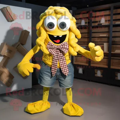 Immagine prodotto di Personaggio del costume della mascotte REDBROKOLY Medusa gialla vestito con una camicia di flanella e papillon