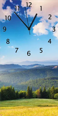 Produktbild von Wallario Design Wanduhr Berglandschaft im Gebirge unter blauem Himmel aus Echtglas, Größe 30 x 60 cm