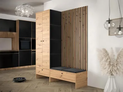 A modern entryway or hallway with a wardrobe and bench set, featuring a kitchen area in the background and a robot vacuum cleaner on the floor.