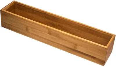 A wooden organizer box on a white background.
