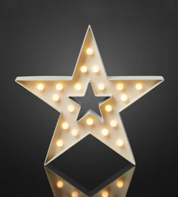 A star-shaped decorative light with multiple small bulbs.