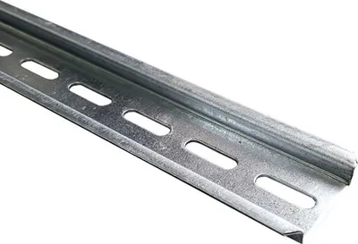 A close-up, angled view of a galvanized metal DIN rail with perforations.