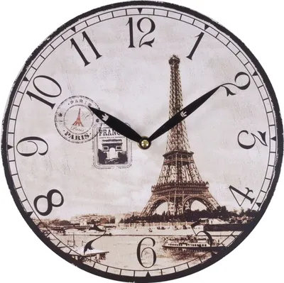 A vintage-style wall clock featuring an image of the Eiffel Tower and Parisian landmarks.