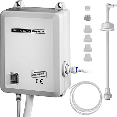 A white electric water dispenser pump with various accessories, including tubing and adapters, is displayed against a white background.