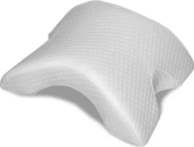 A white ergonomic pillow for side sleepers.