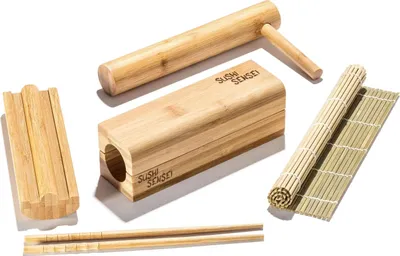 A collection of bamboo sushi-making tools arranged on a white background.
