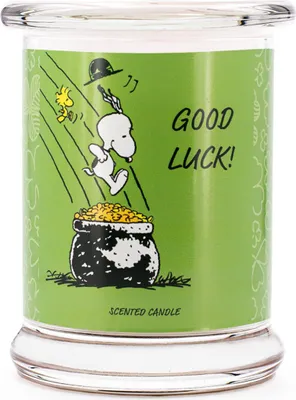 Imagen del producto de Vela aromática Peanuts™ "Buena Suerte", vela en frasco de vidrio, 50 horas de duración, 250g, dimensiones (alto x diámetro): 11,5 x 9,5 cm