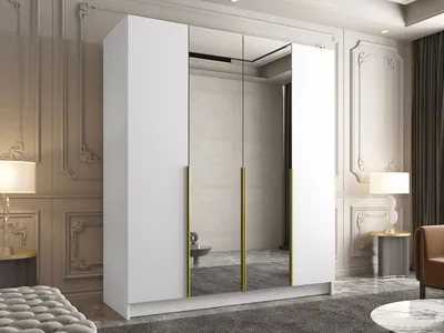 A modern white wardrobe with mirrored doors and gold handles, set in a well-decorated room.