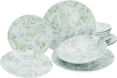 A set of plates with a floral pattern on a white background.