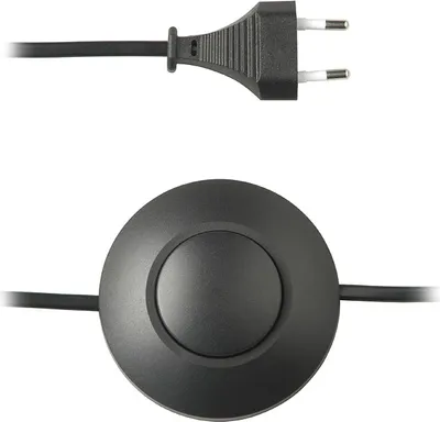A black power cord with a plug and a foot-operated dimmer switch.