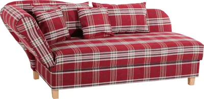 A red plaid chaise lounge with multiple pillows on a white background.