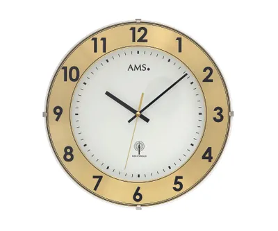 A wall clock with a gold frame and a white face.