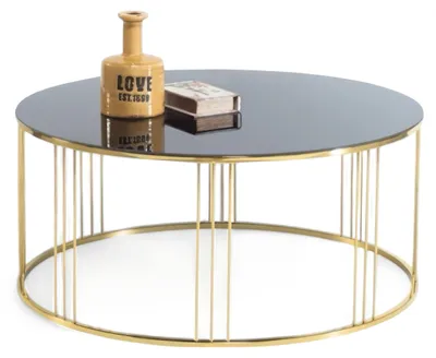 Image de Une table basse remarquable de forme ronde avec un piètement en métal doré