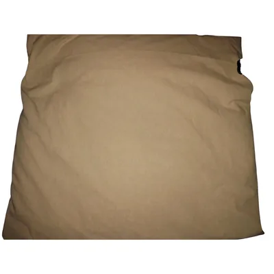 A tan-colored pillowcase is laid flat against a white background.