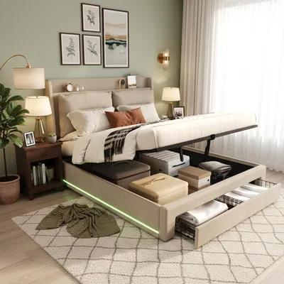 A bedroom scene with a bed that has storage compartments open.