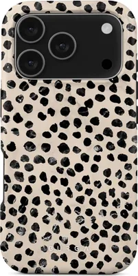 A close-up view of a phone case with a dalmatian-like pattern.