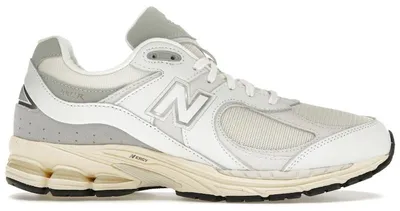 Image de New Balance 2002R, couleur blanc et or - Taille EU 38