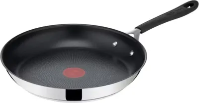A frying pan is shown from a slightly elevated side angle against a white background.