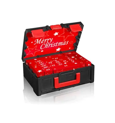 An open black and red advent calendar with Christmas decorations inside.