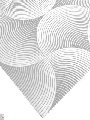 A close-up view of a decorative wall or ceiling panel with a repeating geometric pattern of concentric arcs.