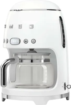 A white SMEG filter coffee machine is shown against a white background.