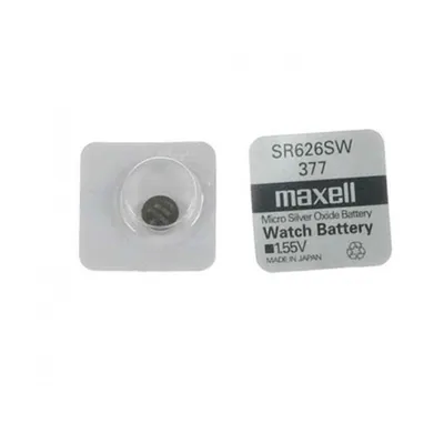 Two watch batteries, one in packaging and one with its packaging and label.
