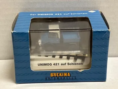 Produktbild von Brekina LKW Unimog 421 blau auf Schienen 2-Wege Fahrzeug 39077