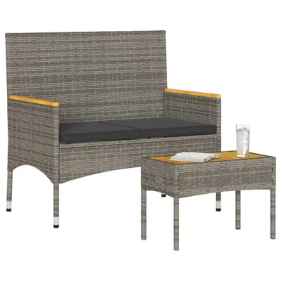 A two-seater garden bench with cushions and a coffee table, set against a white background.