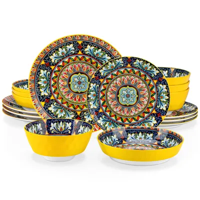 A set of decorative plates and bowls with a colorful, intricate pattern, arranged on a white background.
