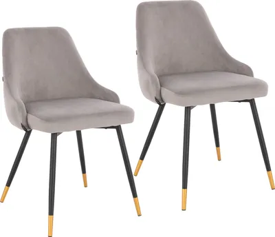 Two gray upholstered dining chairs with black legs and gold accents are shown against a white background.