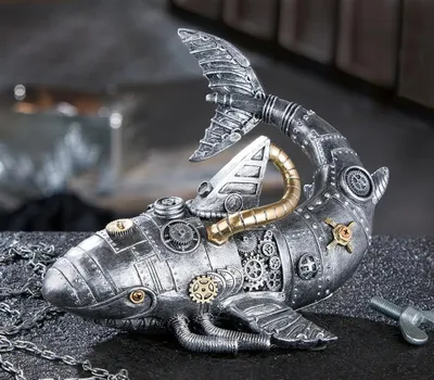 Imagen del producto de Figura de Gilde, tiburón, "estilo steampunk", resina, color plateado, unidad de venta: 2, largo: 23 cm, ancho: 17.5 cm, alto: 16.5 cm. Código: 37727. Número de artículo: 4063387377277