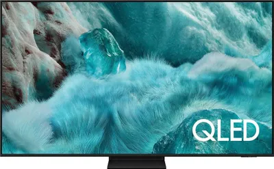 A Samsung QLED TV displaying a colorful abstract image.