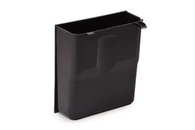 A black plastic coffee ground container is shown against a white background.