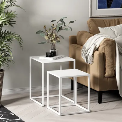 A modern living room scene with nesting side tables.