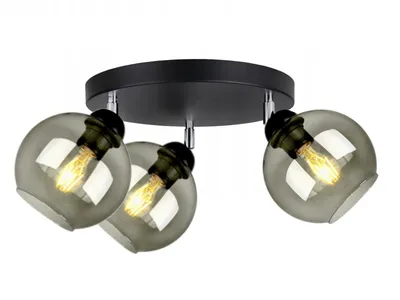 A black ceiling lamp with three smoked glass globes and exposed filament bulbs, presented against a white background.
