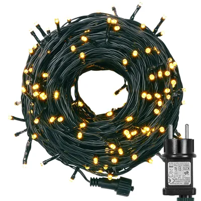 A coiled string of LED lights with a power adapter.