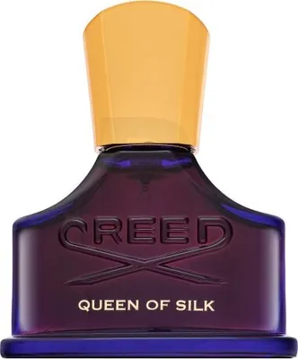 A bottle of Creed Queen of Silk perfume against a white background.
