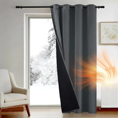 A gray curtain is shown partially covering a window with snow outside. A radiator with orange heat waves emanating from it is visible to the right of the curtain.
