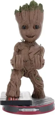 A figurine of the character Groot from Marvel's Guardians of the Galaxy, standing on a circular base.