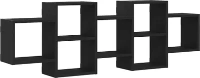 A black modular wall shelf unit against a white background.