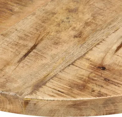 A close-up view of a round wooden table top, showing the grain and texture of the wood.