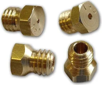 Four brass nozzles are arranged in a collage against a white background.