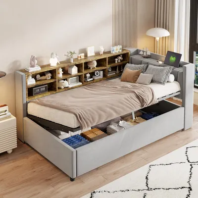 A bedroom setting with a bed, shelves, and storage.