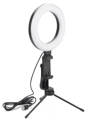 A ring light with a tripod and phone holder is shown against a white background.