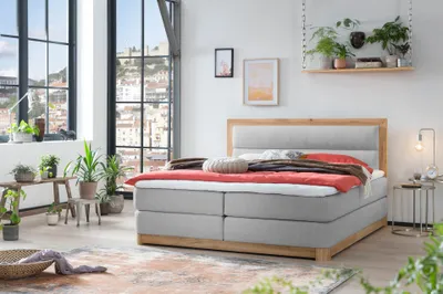 Produktbild von Belanoti Age Boxspringbett 180x200 Eiche 7-Zonen Taschenfederkern Matratze inkl Visco Topper Bett 180x200 in der Farbe Hellgrau H2/H3 Polsterbett Hotelbett mit Massivholz Eiche Massivholzbett