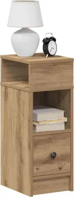 A wooden nightstand with a lamp and an alarm clock on top.