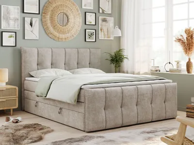 A bedroom scene with a king-size bed, bedside table, and decorative items.